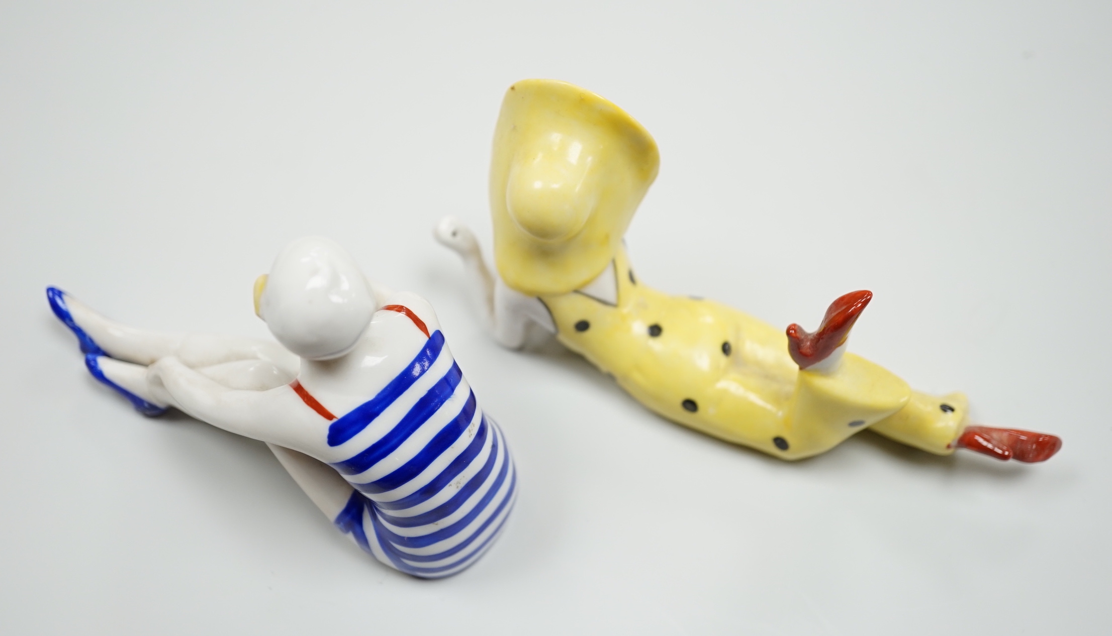 Two German Art Deco porcelain models of bathing beauties, longest 14.5cm